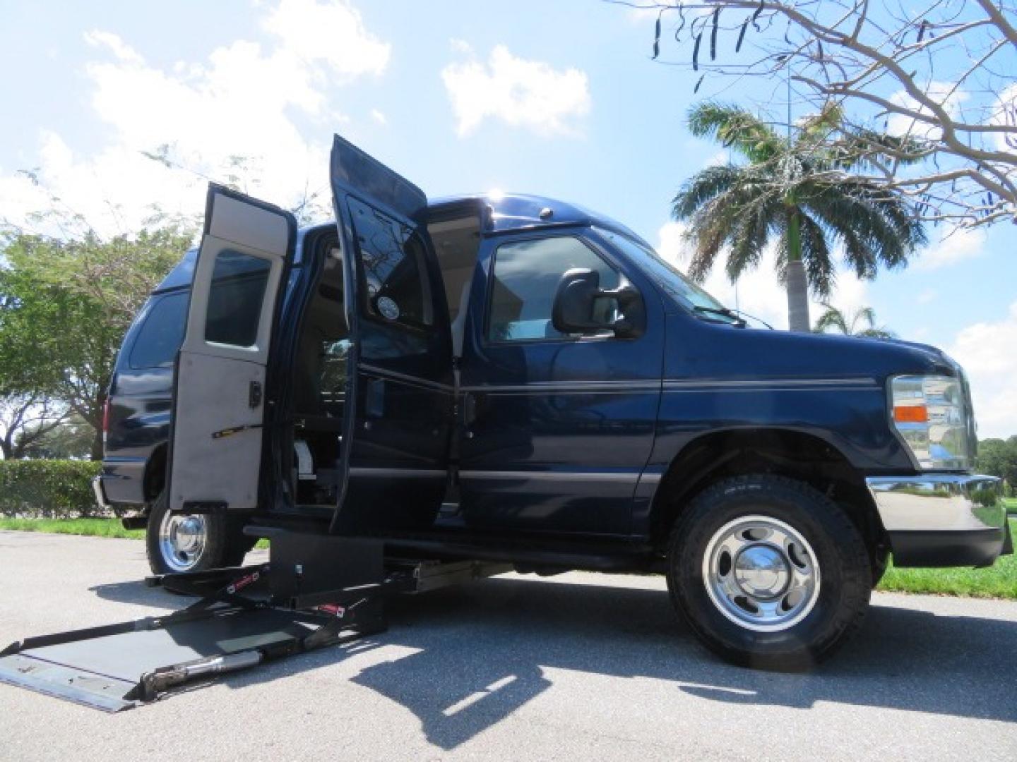 2011 Dark Blue /Gray Ford E-Series Wagon E-350 XLT Super Duty (1FBNE3BS4BD) with an 6.8L V10 SOHC 20V engine, located at 4301 Oak Circle #19, Boca Raton, FL, 33431, (954) 561-2499, 26.388861, -80.084038 - You are looking at a Gorgeous 2011 Ford Econoline E350 XLT Norcal Max High Top Handicap Wheelchair Conversion Van with 6.8L V10, 15K Original Miles, 9 Inch Lowered Floor, Braun UVL Side Entry Wheelchair Lift, Remote Control Power Side Entry Doors, Expanded Side Entry Doors, Q Straint Tie Down, Syste - Photo#45